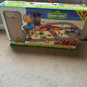 Vintage Sesame Street race car toy